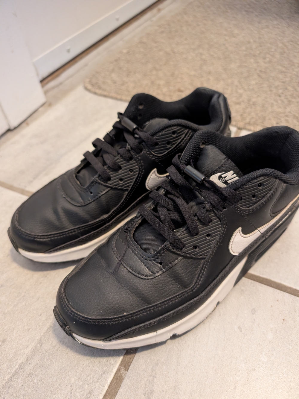 Nike Air Max 90 Black and White Leather Sneakers